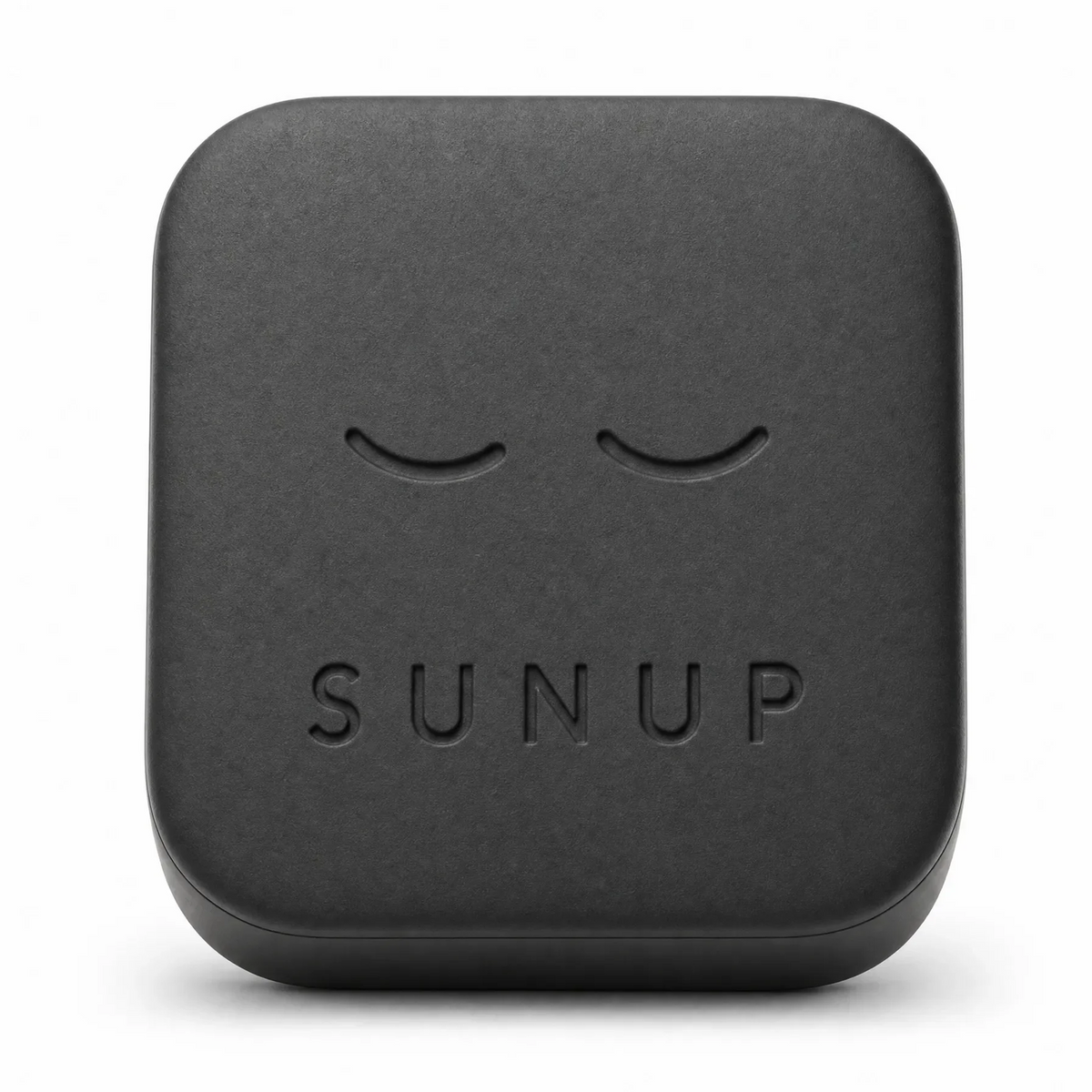 The Sunup Block, matte black with the SUNUP wordmark debossed below two closed eyes